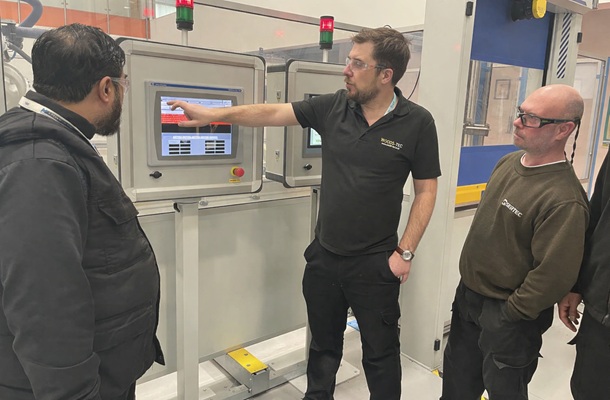 Image of engineering students receiving hands-on training